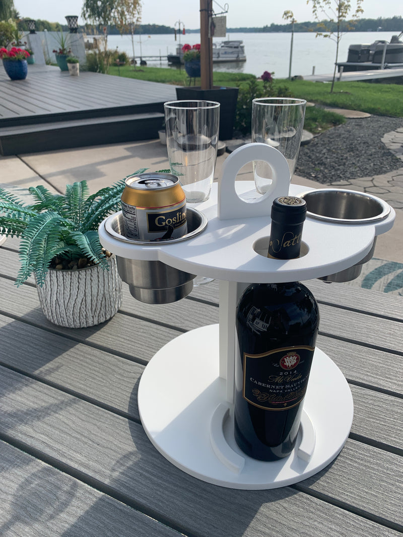 Load image into Gallery viewer, White Table Top Cup and Wine glass holder placed outdoors with Wine bottle
